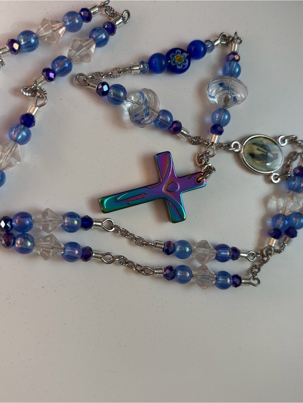 4/$100 Iridescent Blue Beaded Cross Necklace - Unbranded